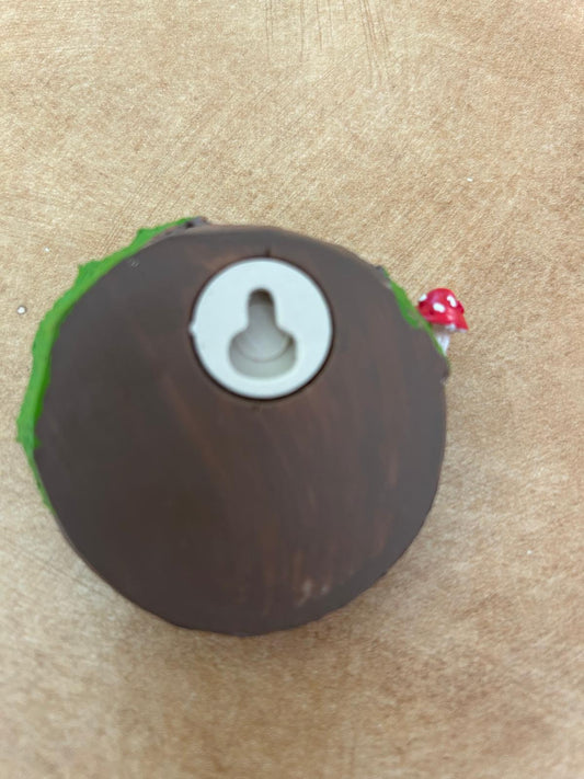 Fairy window with mushrooms figurine back view showing keyhole mount