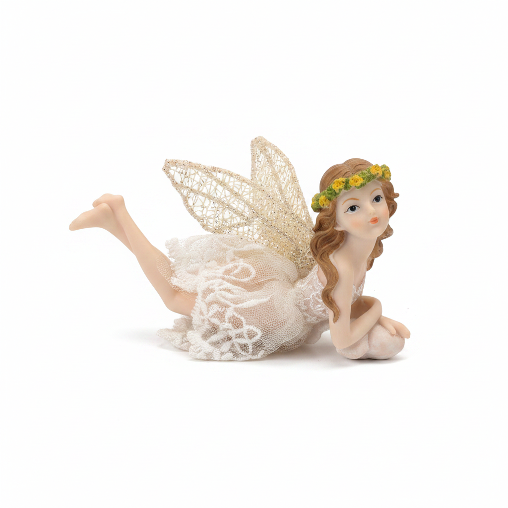 Studio product photo of reclining fairy figurine with lace dress and golden wings