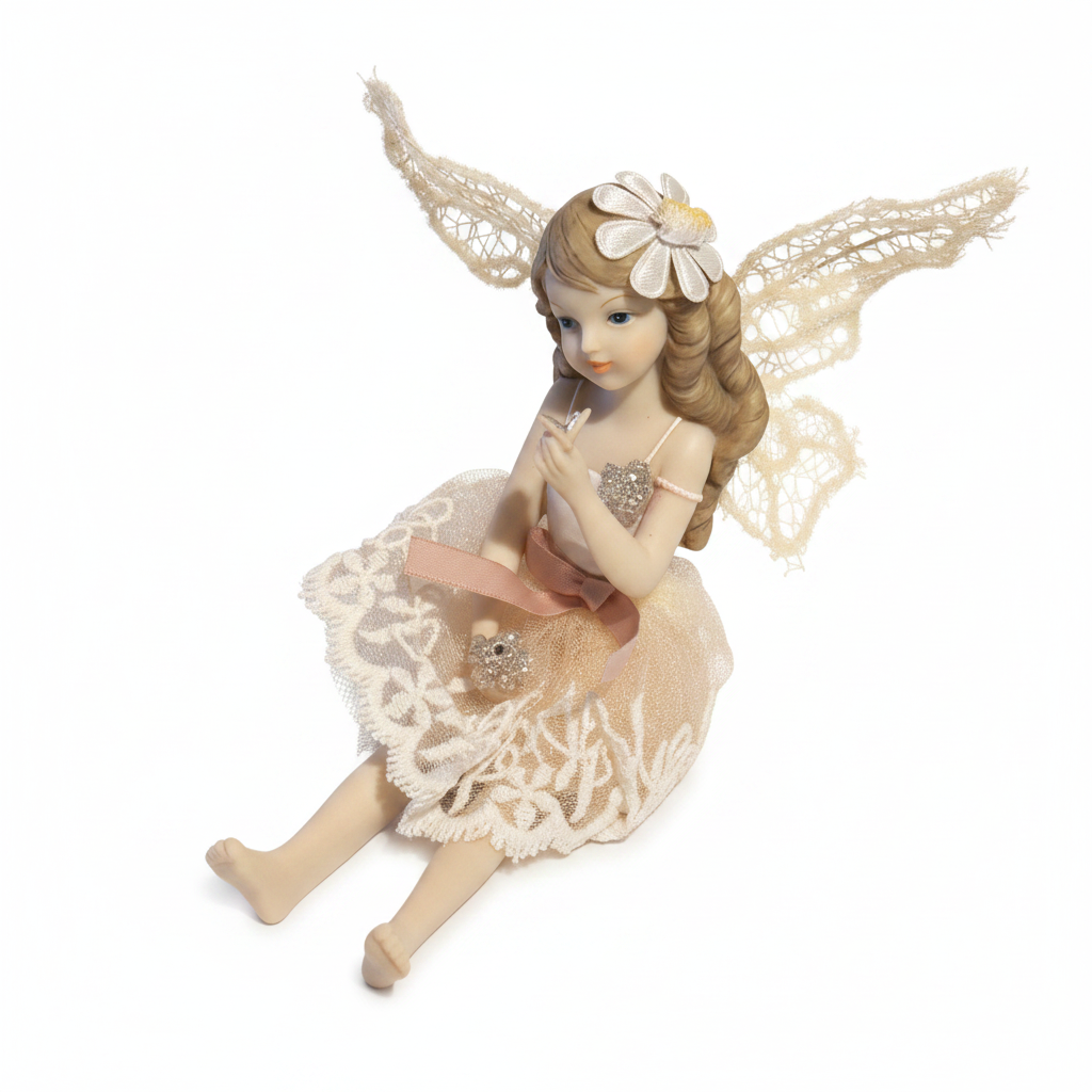 Studio product photo of seated fairy figurine with daisy crown and jewelled heart