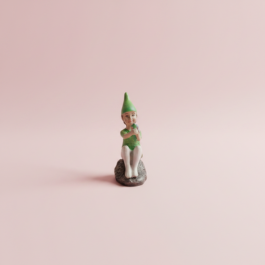 Elf Sitting on Rock